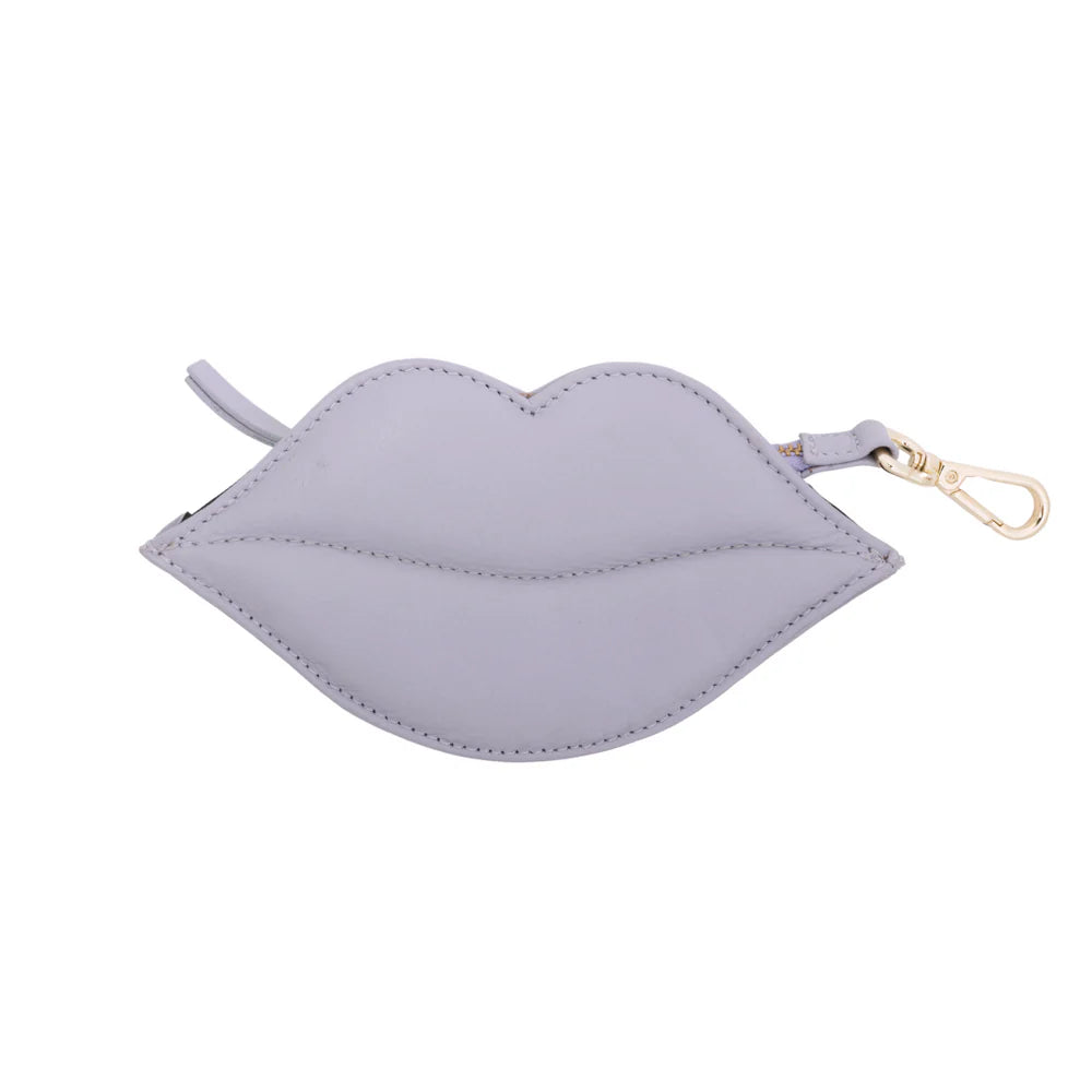 Lilac leather dog waste bag dispenser in lip shape with clip-on hook.