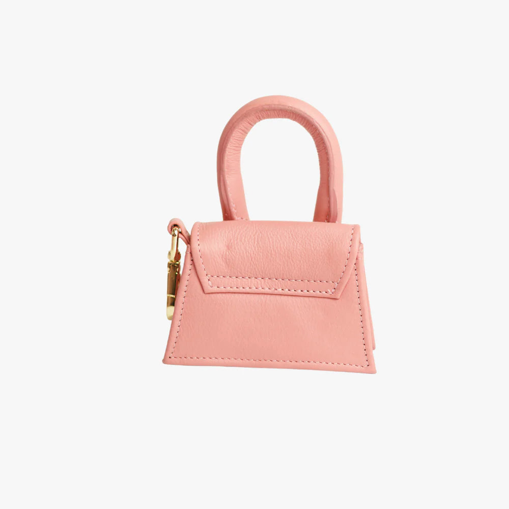 Roze Designer tas voor hondenkoekjes en poepzakken.