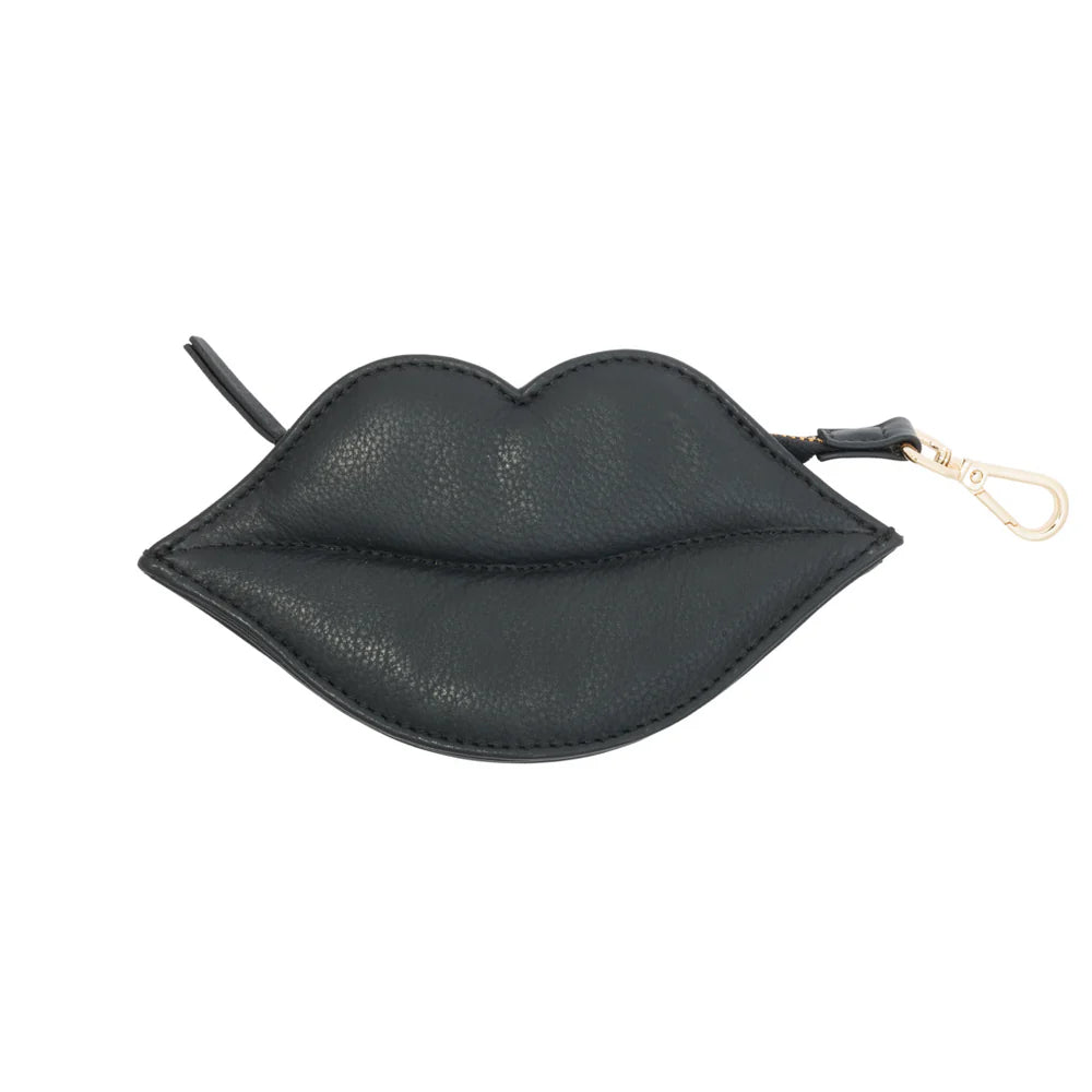 Black leather poop bag holder shaped like lips with clip-on hook.